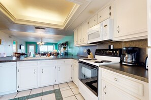 Fridge, microwave, oven, stovetop - Dog-Friendly Oceanfront Home Features Shared Pools, Tennis, Hot Tubs, & Views (South Padre Island)