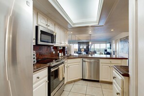 Fridge, microwave, oven, stovetop - Ground-Floor Waterfront Condo with Shared Hot Tub, Pool, Tennis - Close to Beach (South Padre Island)