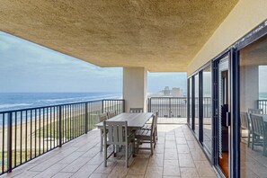 Outdoor dining - Corner Beachfront Condo Features Ocean Views, Shared Pool, Hot Tub, Tennis Court (South Padre Island)