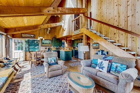 Televisio, DVD-soitin, kirjoja, stereot