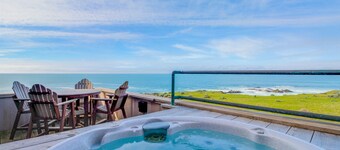 Large oceanfront home with hot tub, shared pool, & large deck - dogs welcome