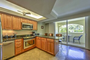 Fridge, microwave, stovetop, dishwasher - Marco Island Condo w/ Patio: Steps to Beach Access (Marco Island)