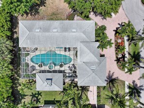 A heated pool, pool loungers
