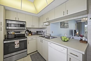 Fridge, microwave, oven, stovetop - Coastal Style Condo | Pool, Spa & Steps to Beach (Marco Island)