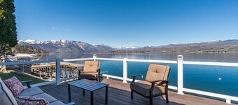 Modern lakefront home with private dock, amazing sunset views, & chef's kitchen