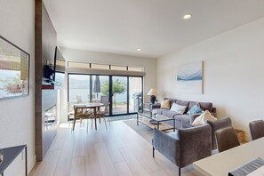 TV, fireplace, DVD player, stereo - Lakefront Condo with Mountain Views, Free WiFi, and Shared Pool and Hot Tub (Chelan)