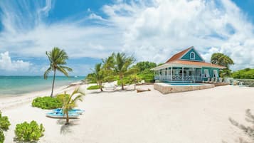 On the beach, sun loungers, beach towels