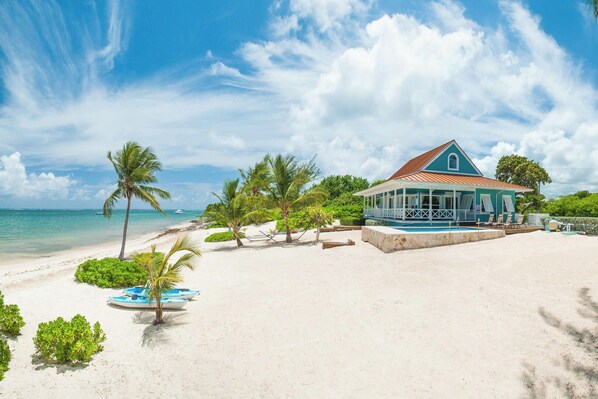 On the beach, sun-loungers, beach towels