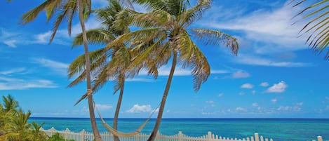 On the beach, sun-loungers, beach towels