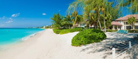 On the beach, sun-loungers, beach towels