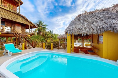 Waterfront villa with private pool, balcony, partial AC, fast WiFi - near beach