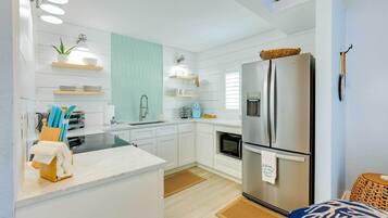 Fridge, microwave, stovetop, coffee/tea maker