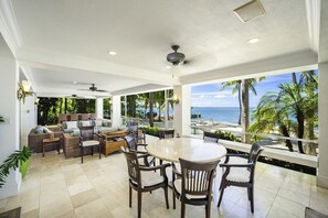 Dine alfresco at the outdoor table with beautiful blue views.