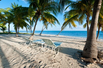 Blossom Village Cottage – Charming Beachfront Cottage by Cayman Villas.