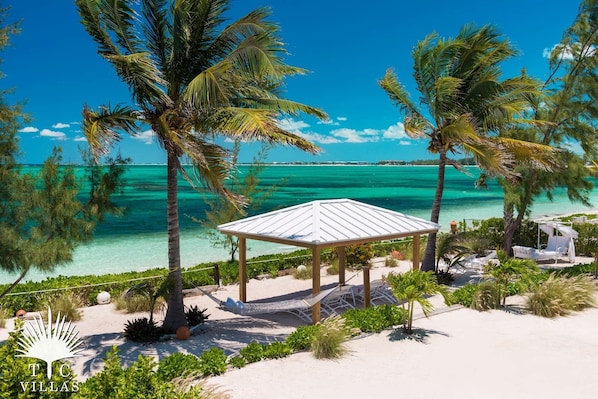 On the beach, sun-loungers, beach towels