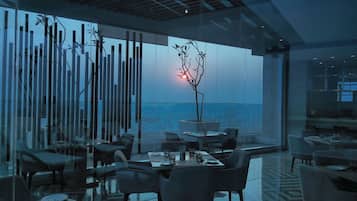 Breakfast, lunch, dinner served; Indian cuisine, pool views