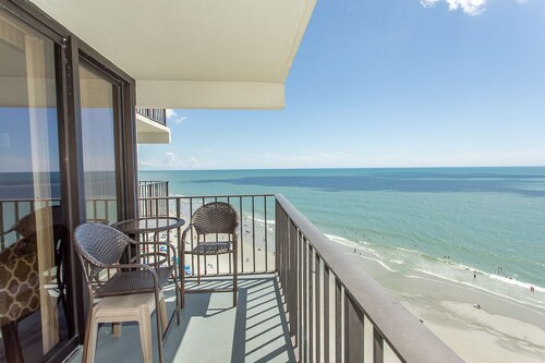 BRIGHT AND CHEERY TWO BEDROOM OCEAN FRONT CONDO STEPS AWAY FROM THE OCEAN!