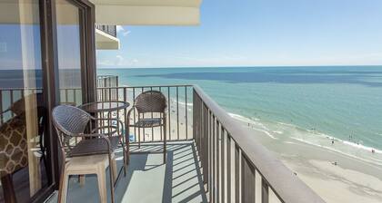 BRIGHT AND CHEERY TWO BEDROOM OCEAN FRONT CONDO STEPS AWAY FROM THE OCEAN!