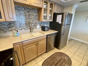 Fridge, microwave, oven, stovetop - Vacation Villas #335 - Beachfront Condo with Amazi (Fort Myers Beach)