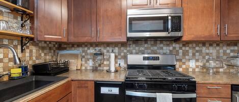 Fridge, microwave, stovetop, coffee/tea maker