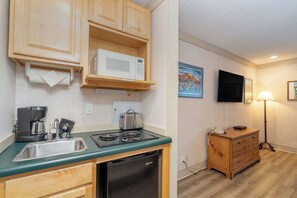 Fridge, microwave, stovetop, coffee/tea maker
