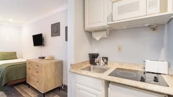 Fridge, microwave, stovetop, coffee/tea maker