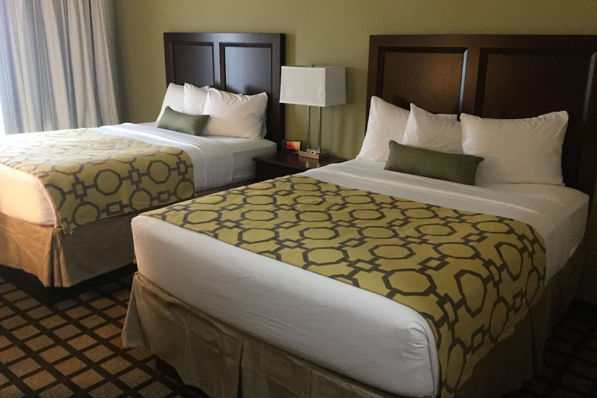 Room, 2 Queen Beds, Non Smoking | Desk, blackout drapes, iron/ironing board, free cribs/infant beds