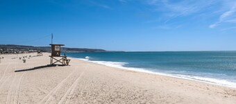 A beach beauty, this exceptional upper unit is beaming with Balboa beach charm!