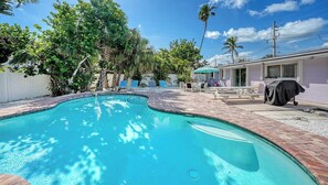 Outdoor pool, a heated pool - CHARMING COTTAGE W/HEATED POOL, Close to Gulf & Bay Beach, FREE WiFi/Trolley, Dog*(See Note) Friendly! (Anna Maria)