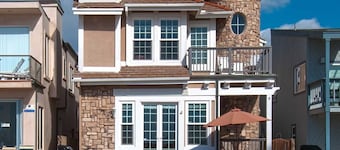 Breathtaking, unique & highly upgraded lower unit right on the Balboa Boardwalk!