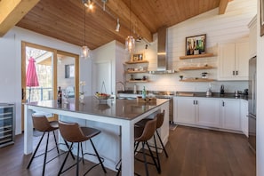 Fridge, microwave, oven, stovetop - Chalet Trappeur | Luxury Ski Chalet | Hot Tub, Indoor/Outdoor Fireplace & Private Backyard (Mont-Tremblant)