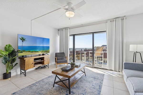 Bright and inviting living space with cozy seating and plenty of natural light