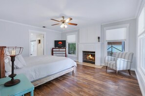 Entering bedroom 1 which has a gas fire place and attached bathroom (1). - On the Creek, Sleeps 10, Close to Town - Perfect Wimberley Escape (Wimberley)