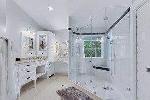 This bathroom has a large walk-in shower with lots of natural light. - On the Creek, Sleeps 10, Close to Town - Perfect Wimberley Escape (Wimberley)