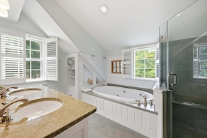 Bathtub, jetted tub, hair dryer, towels