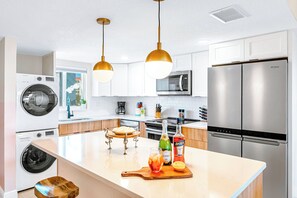 Fridge, microwave, oven, stovetop - Unbeatable Ocean Views Family Friendly Condo on the Beach by the Pier (Cocoa Beach)