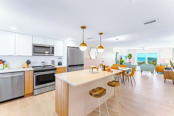 Fridge, microwave, oven, stovetop - Unbeatable Ocean Views Family Friendly Condo on the Beach by the Pier (Cocoa Beach)