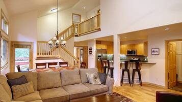 Smart TV, fireplace, table football, books