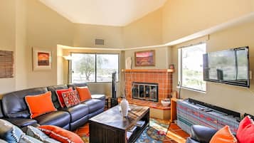 TV, fireplace, books, offices