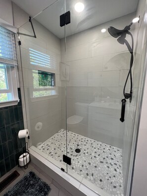 Combined shower/tub, jetted tub