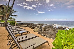 Relax on the beach with sun loungers and enjoy the ocean view from the hotel's balcony or terrace.