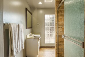 Shower, towels, soap, toilet paper