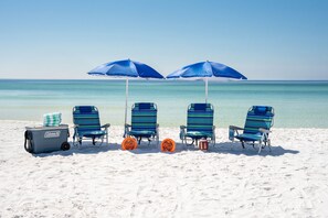 On the beach, sun-loungers, beach towels