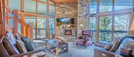 Televisor de pantalla plana, llar de foc, reproductor de DVD i estèreo