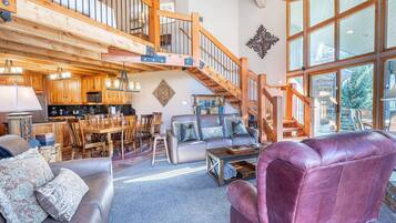 Flat-screen TV, fireplace, DVD player, stereo