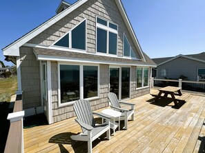 Outdoor dining - CH1605- SoundFront 4 BRs, Boat Dock, Com Pool, Tennis, Dog Friendly. (Kill Devil Hills)