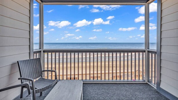 A balcony with a view of the beach and ocean. - *Fall into Savings-20% Off New Bookings thru 2026* (Garden City)