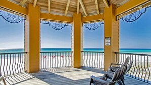 A wooden deck with a view of the ocean, a sign indicating it's for owners and guests only, and a bench. - Two Balconies, Gorgeous Views of the Gulf, Beachy Flair (Miramar Beach)