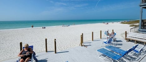 On the beach, sun-loungers, beach towels