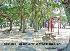 Stroll along the serene walking path lined with trees and enjoy a tranquil setting for relaxation.